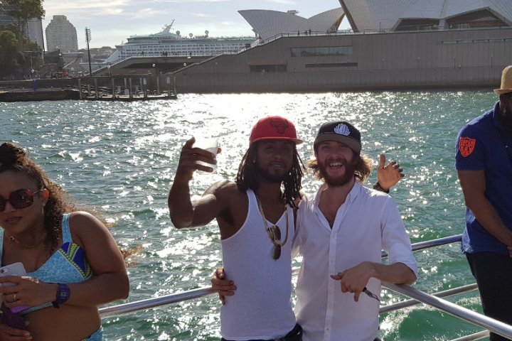 two guys in front of opera house in Sydney