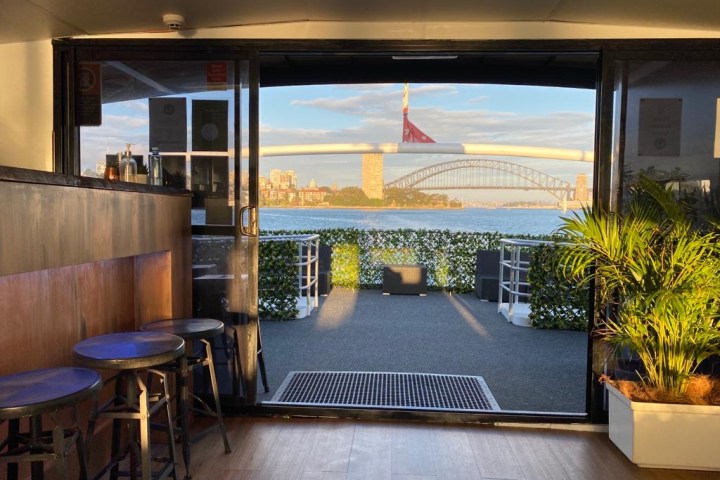 a room filled with furniture and a large window