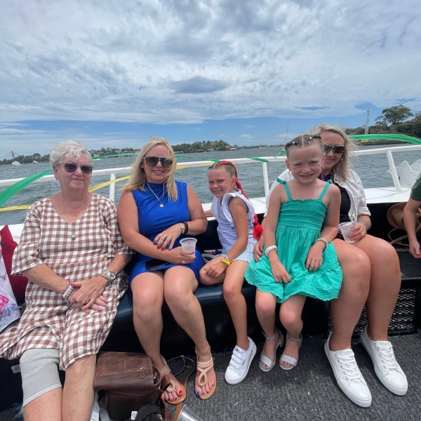 Maria Lark et al. standing next to a body of water