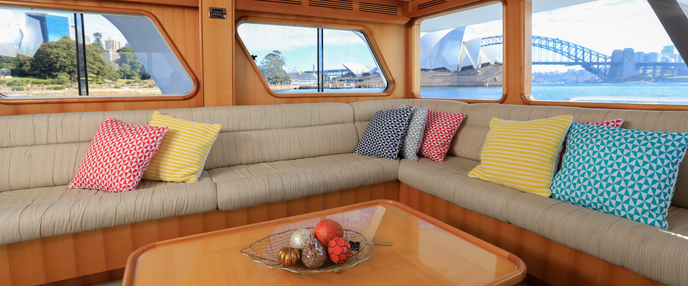 a living room filled with furniture and a large window