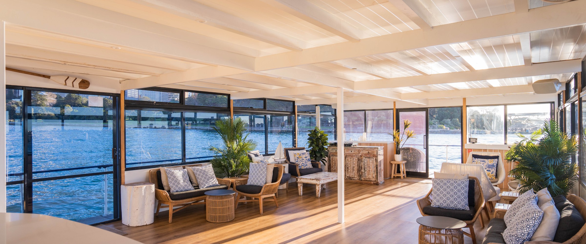 a room filled with furniture and a large window