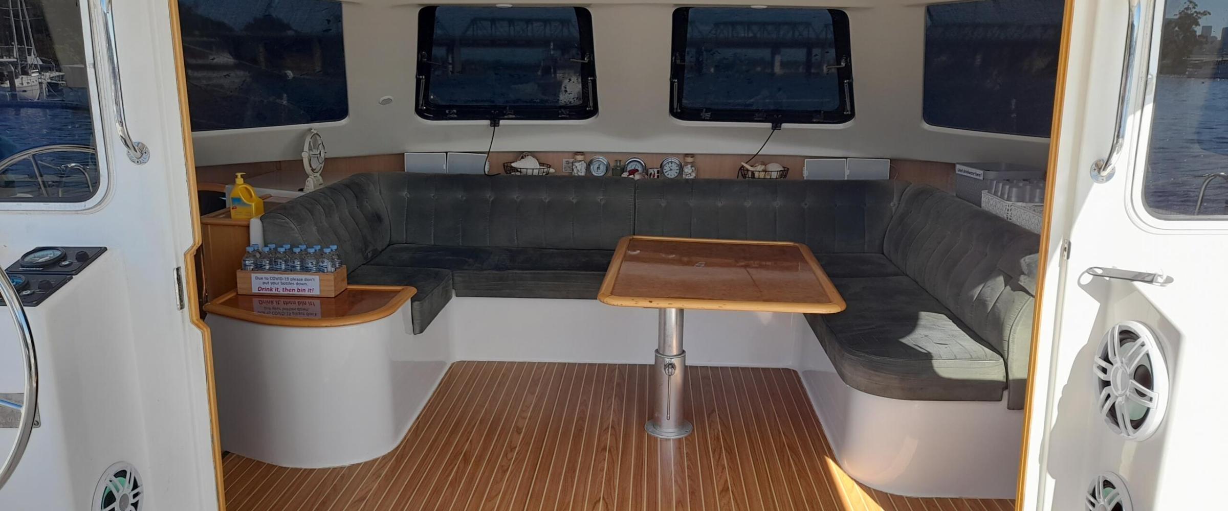 a desktop computer sitting on top of a microwave