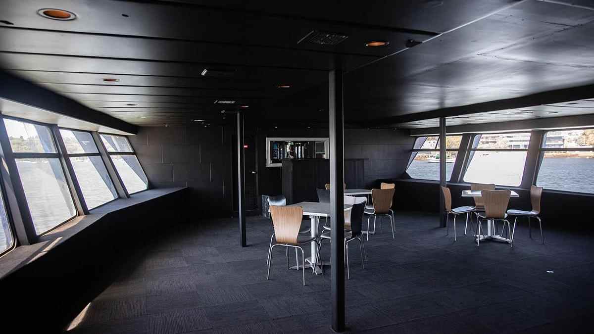 a room filled with furniture and a large window