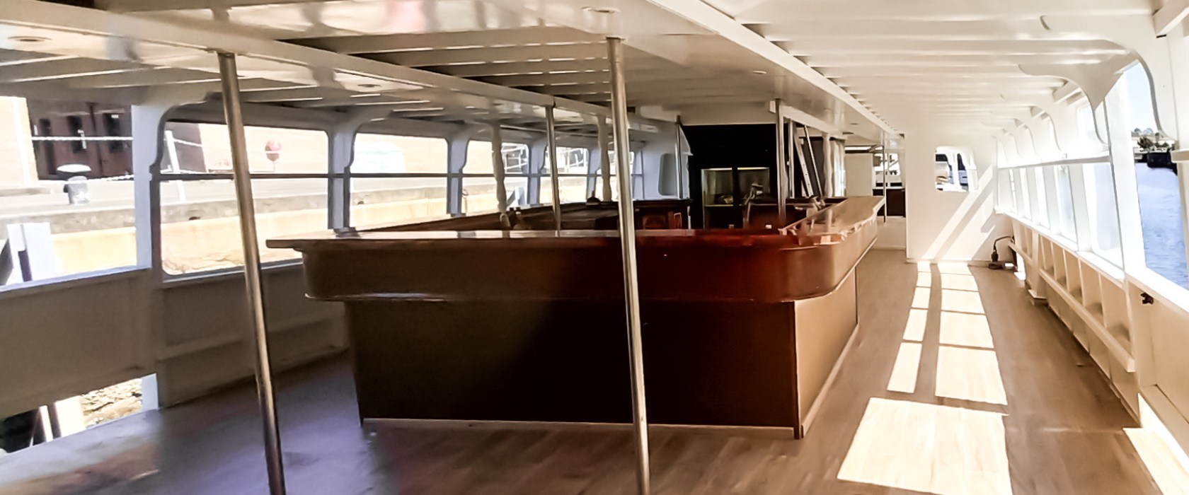 a plane sitting on top of a wooden floor